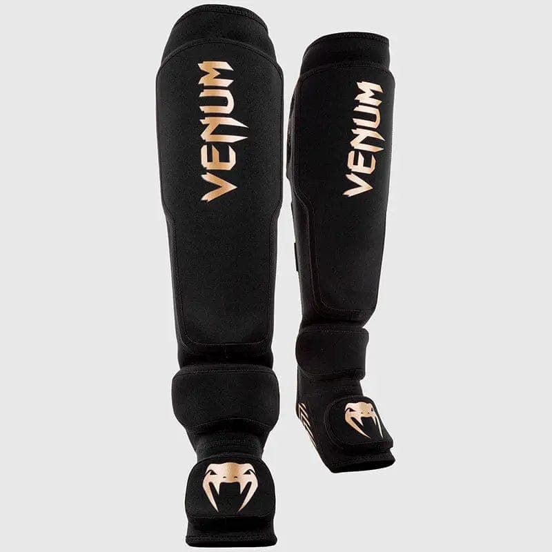 Venum Kontact Evo — protège-tibias noir et or